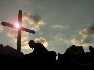 kneel at cross
